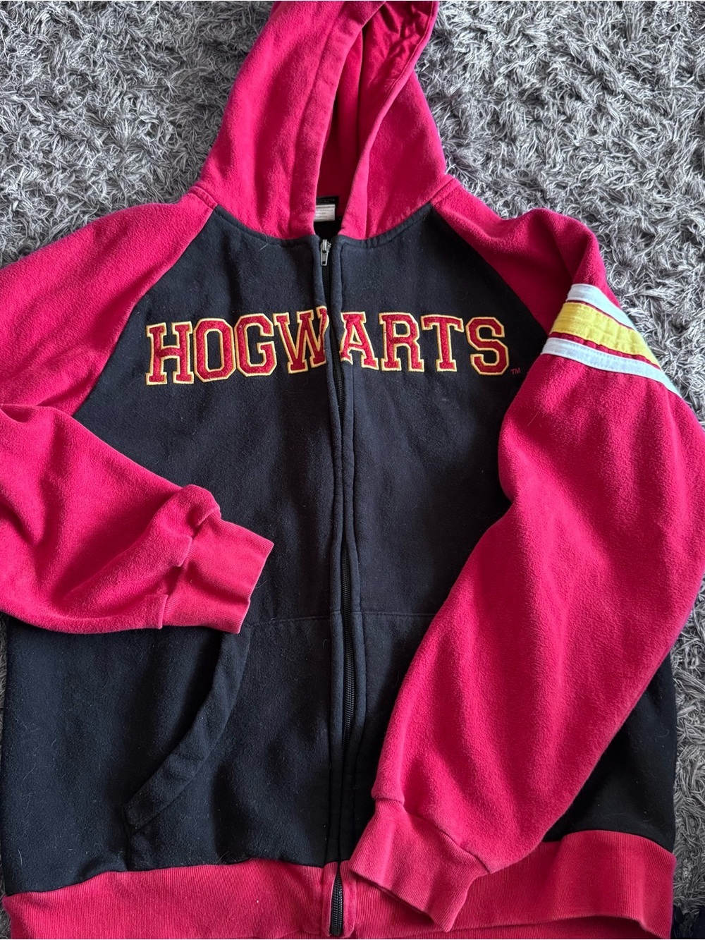 Warner Bros. Hogwarts Kids Pink and Black Zip Hoodie with Yellow Accent